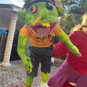 Green Monster Puppet with Orange Shirt